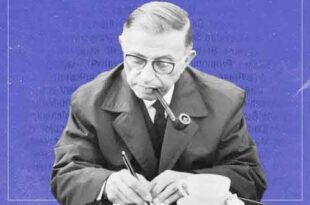 ژان پل سارتر در حال نوشتن با پیپی بر لب